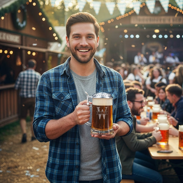 Smiling man in blue plaid shirt holding a beer stein at an outdoor festival with string lights and crowd.