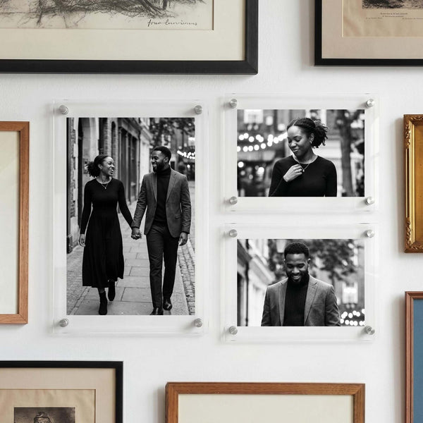 Acrylic photo print featuring three black and white couple portraits