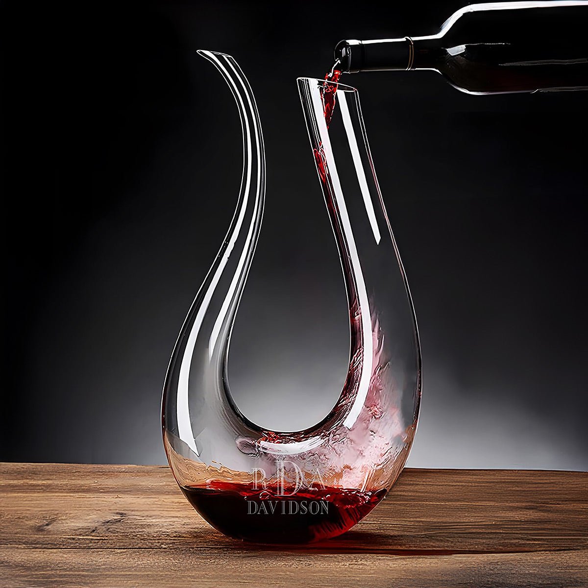 red wine pouring into a custom dolcetto decanter