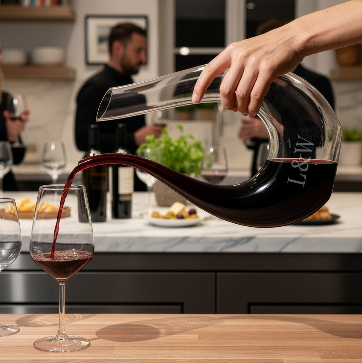 red wine being poured from Dolcetto Decanter to the Wine Glass