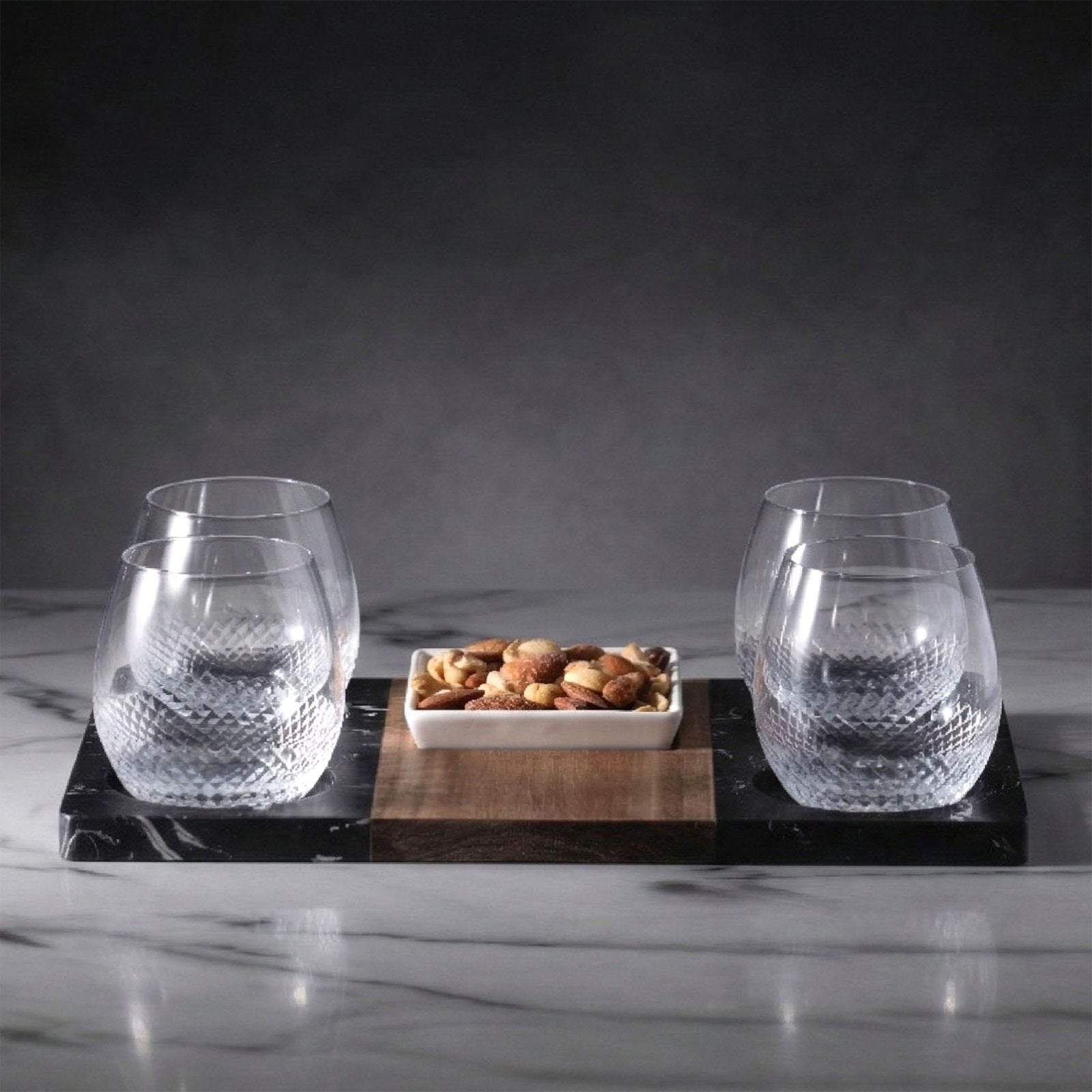 4 empty Avignon glasses with marble serving tray and nuts