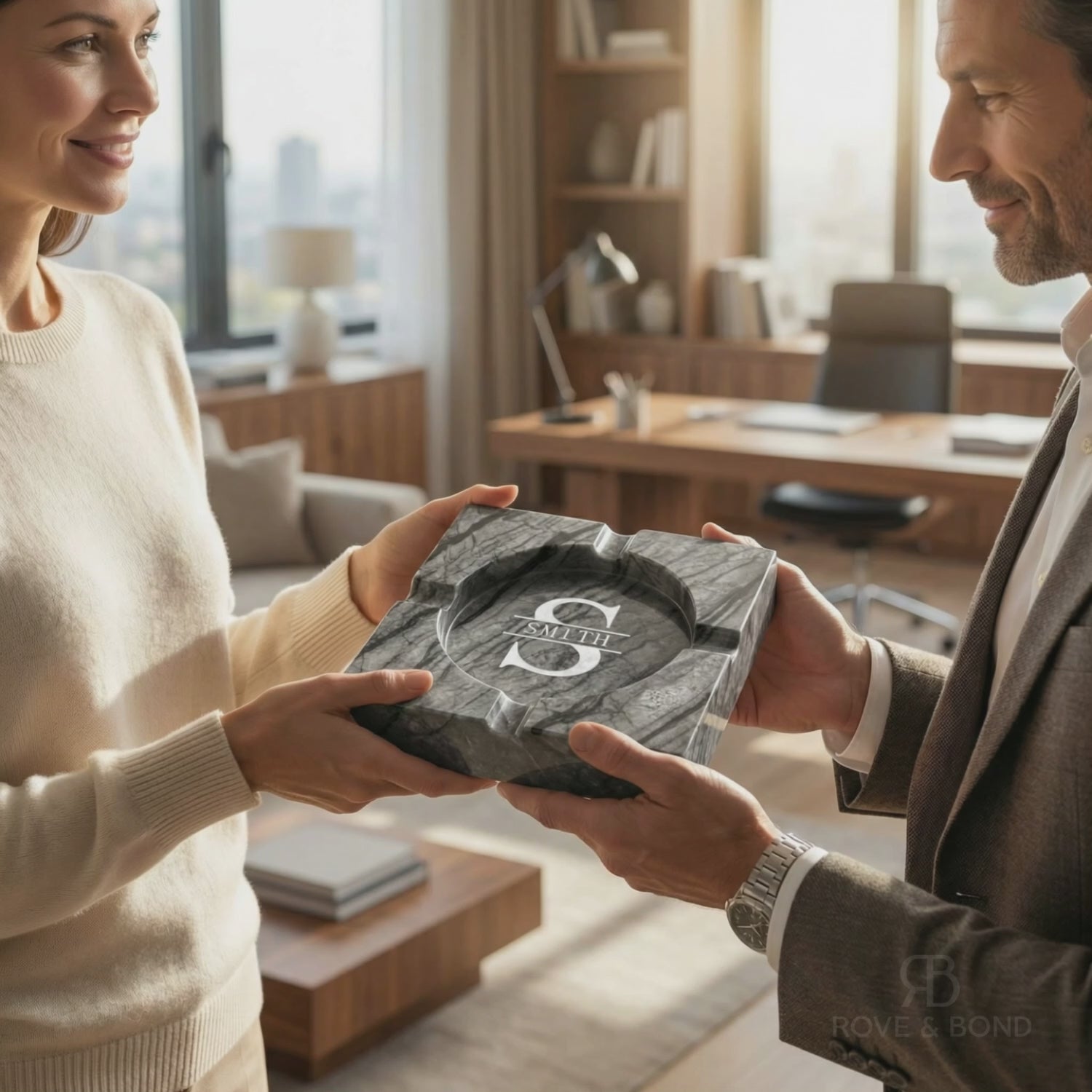 woman and man holding large marble ashtray