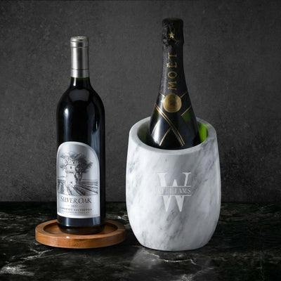 reed slanted marble wine chiller with bottles and wooden coaster